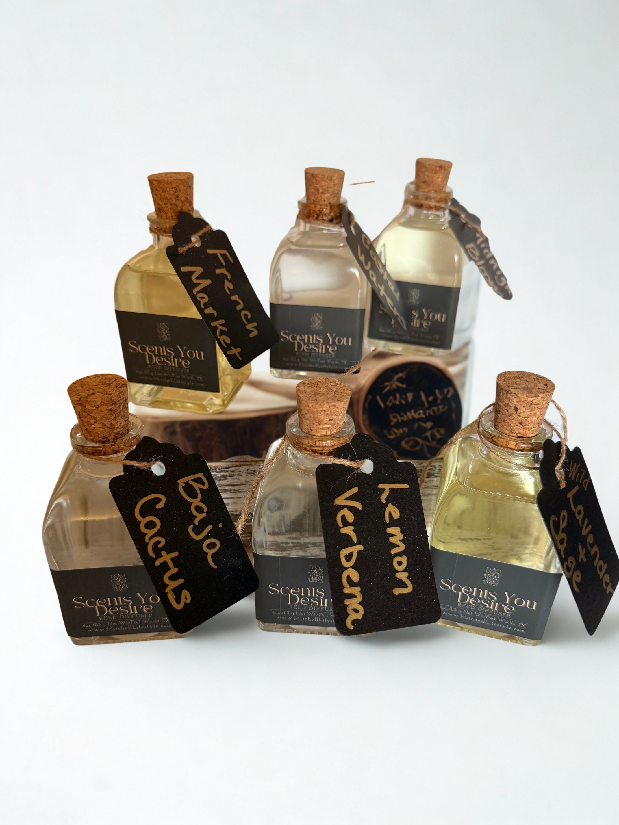 Luxury reed diffusers collection by Scents You Desire styled in a refined living space