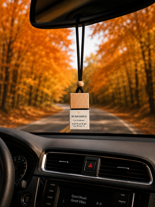 Burnished car diffuser hanging from car mirror