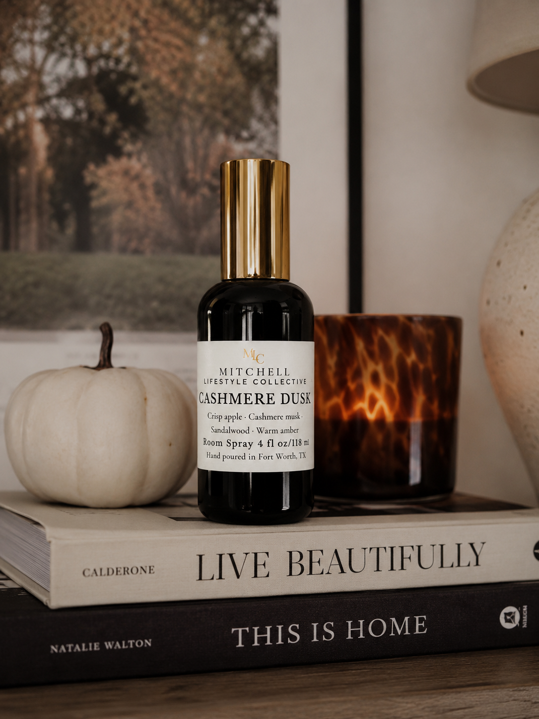 Cashmere Dusk room spray on a styled tabletop