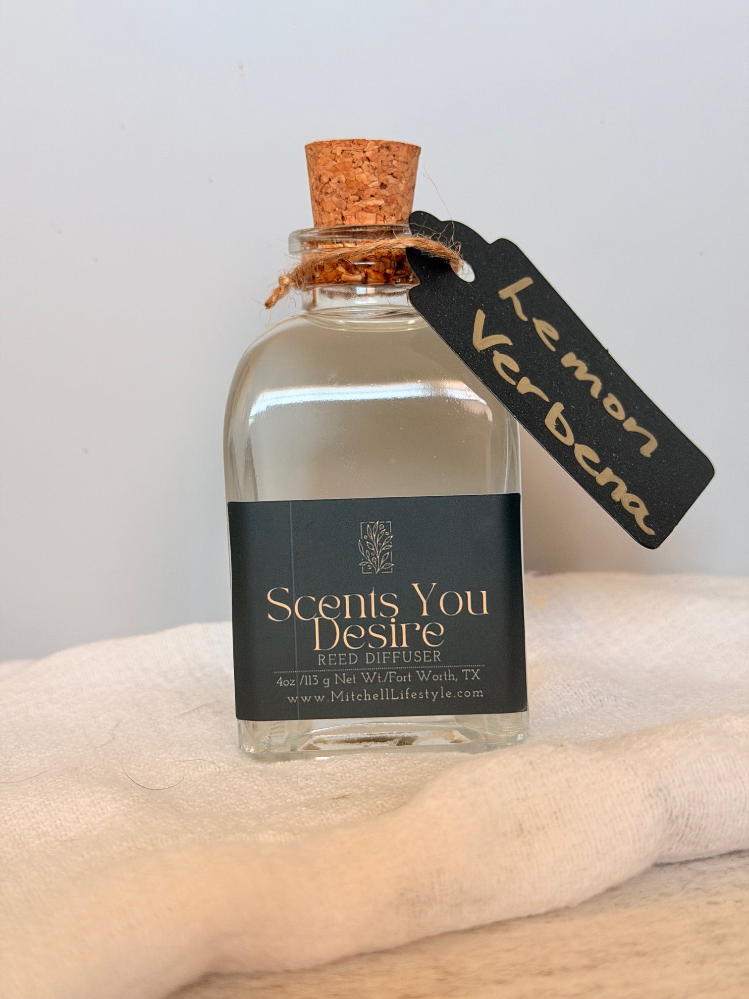 Lemon Verbena luxury reed diffuser by Scents You Desire in a clean, modern kitchen