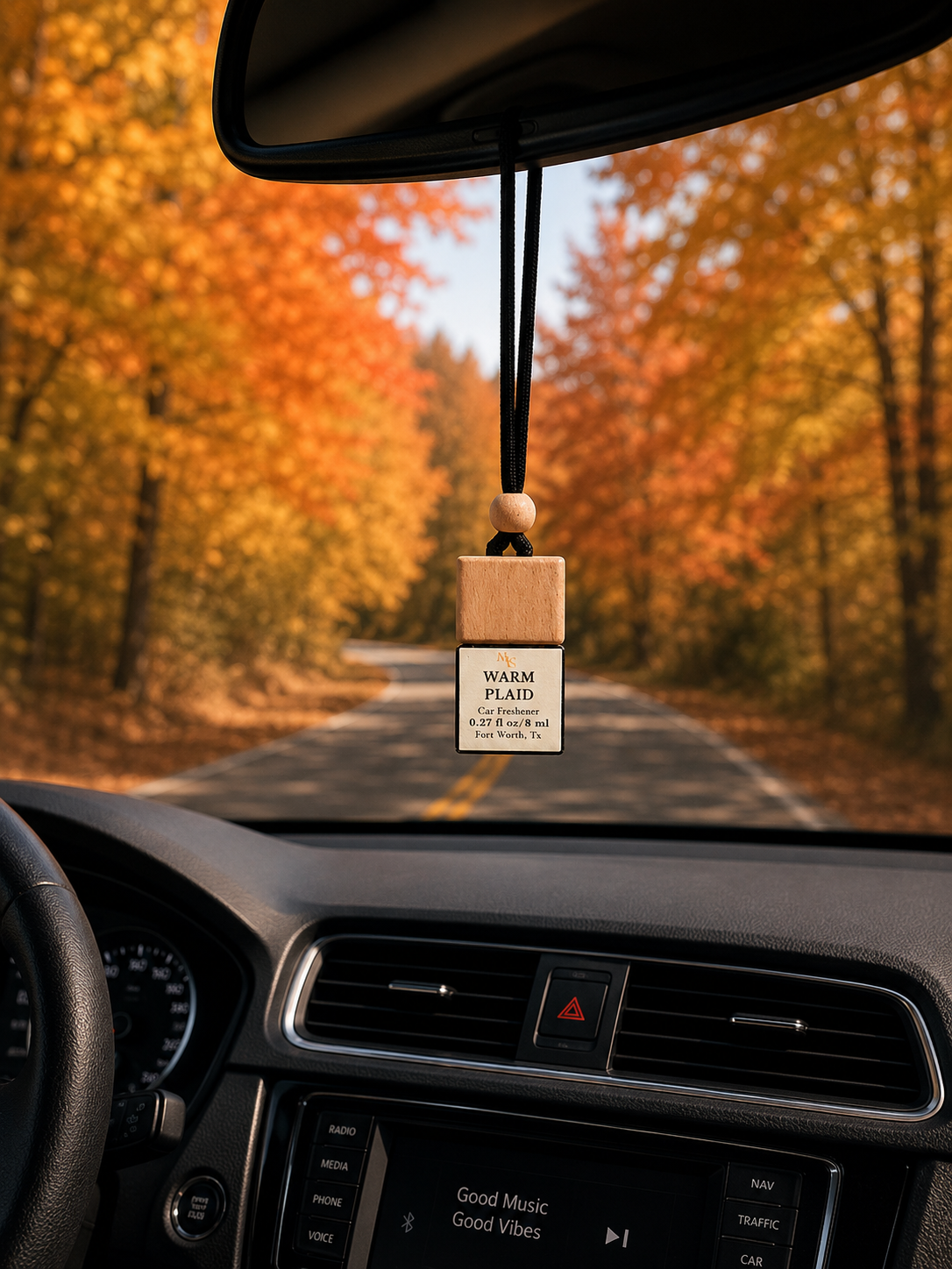 Warm Plaid car diffuser hanging from car mirror